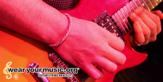 Company uses guitar strings to raise money for charity