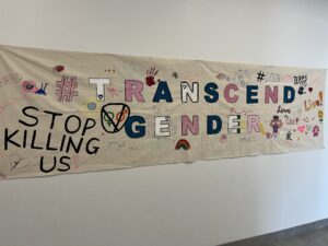 Sign from outside of the LGBTQ+ Resource Centre.